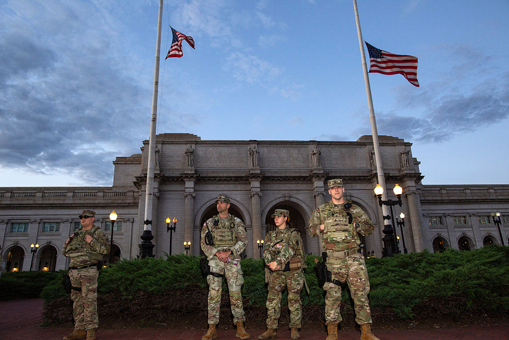 Members of the U.S. National Guard patrol Union Station,...