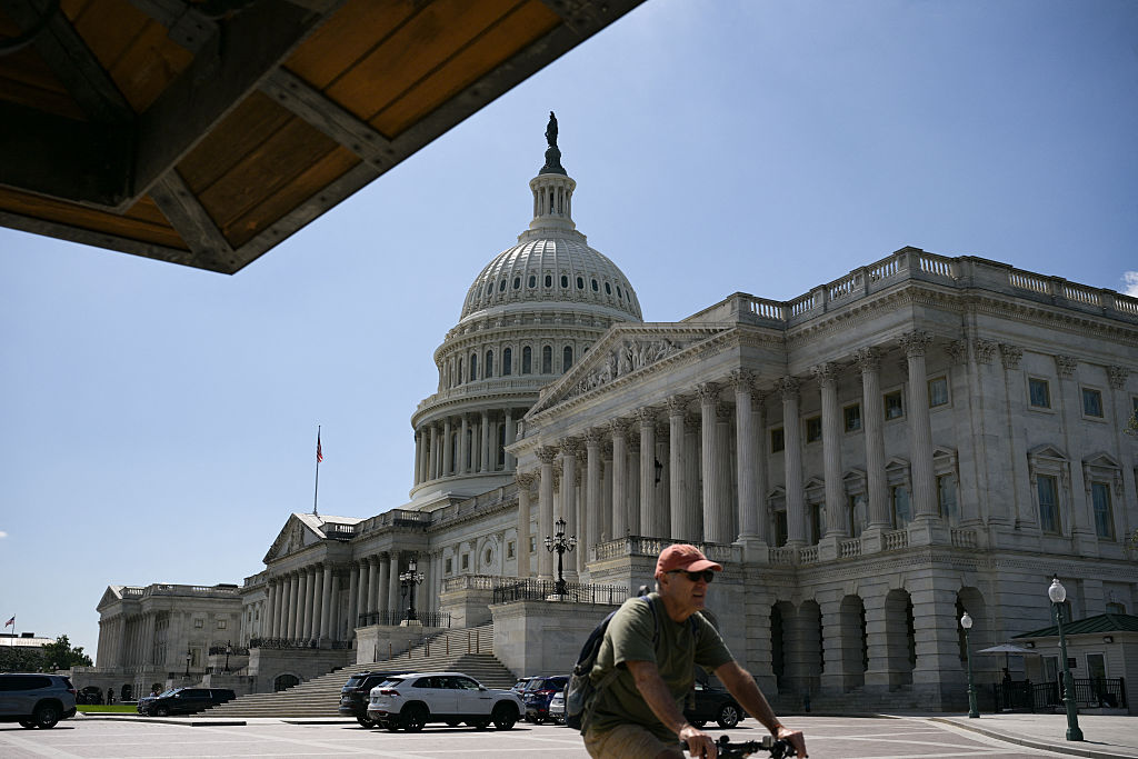 Crypto Investors Fund Big, Gaudy, Golden Statue Of Trump Holding Bitcoin In Front Of The Capitol. But Why, Though?