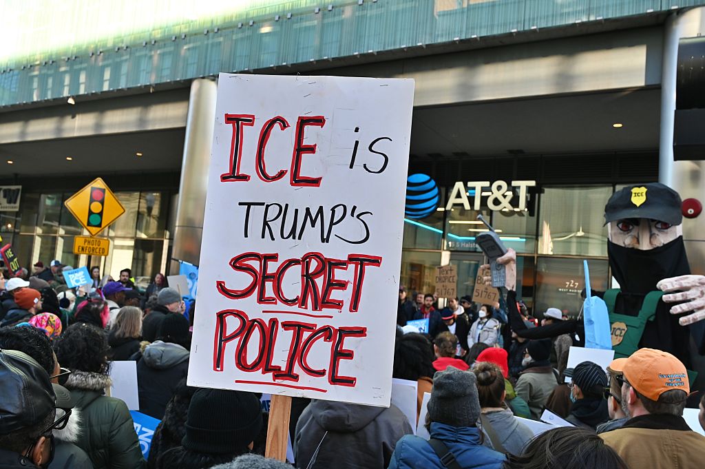 Protesters rally in Chicago urging AT&T to cut ties with ICE and CBO