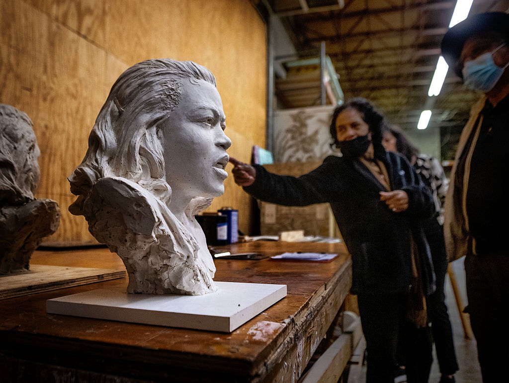 Steven Weitzman, who is sculpting a statue of Barbara Rose Johns to replace Robt. E. Lee in the Capitol, works with surviving family membes on her likeness in his studio on March 24 in Mt. Ranier, MD.