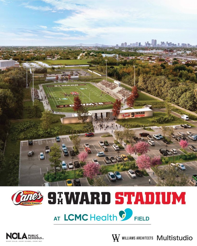 Aerial view of Canes 9th Ward Stadium at LCMC Health Field, home of the NOLA Public Schools football team, with downtown skyline in the background.