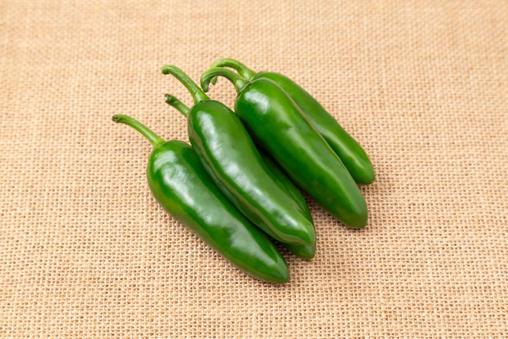 Jalapeños placed on a linen cloth