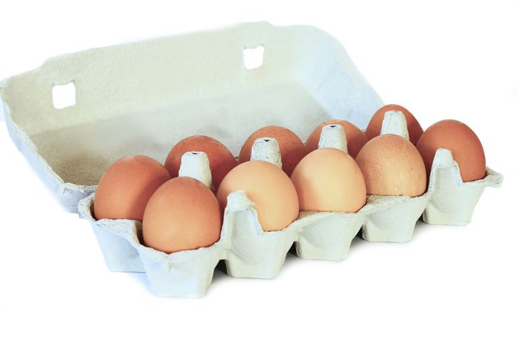 fresh organic eggs in carton natural light rustic farm produce with clean composition food detail no people stock photo