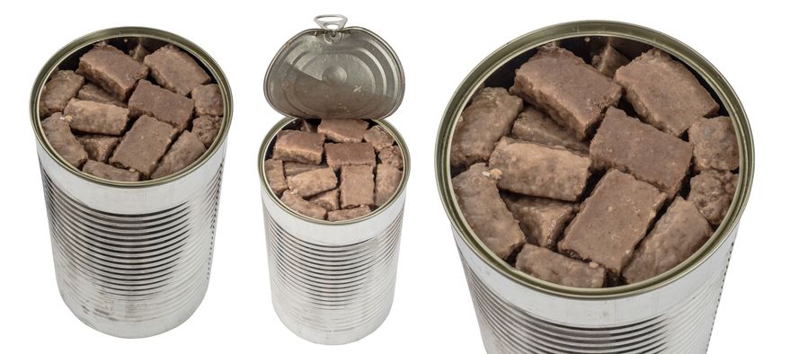 A collection set of open metal cans filled with chunked wet dog food chunks, viewed from different angles showing textured meat pieces